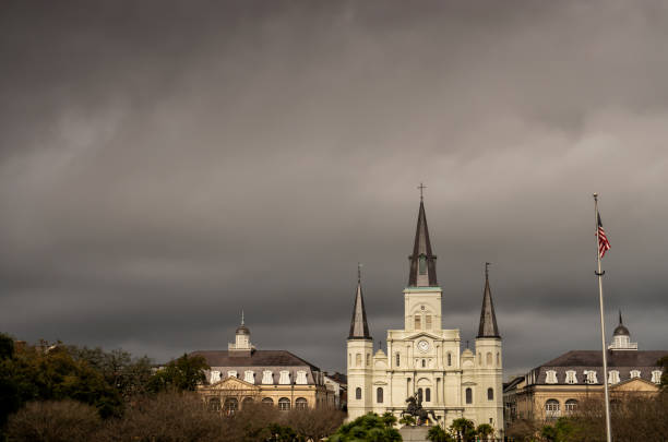 February 2020 Dark storm clouds linger over Jackson square in New Orleans weeks before coronavirus outbreak hits the city.