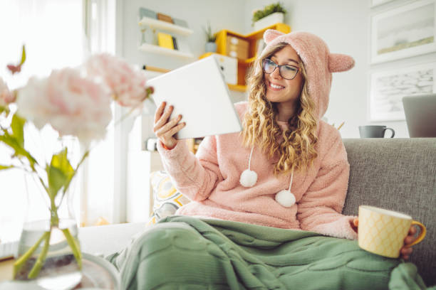 istock Young woman at home 1219947700
