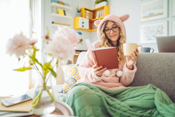 istock Young woman at home 1219947905