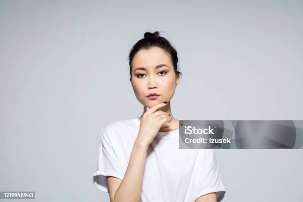 Pensive Beautiful Asian Young Woman Stock Photo - Download Image Now - Hipster Culture, 20-24 Years, Adult