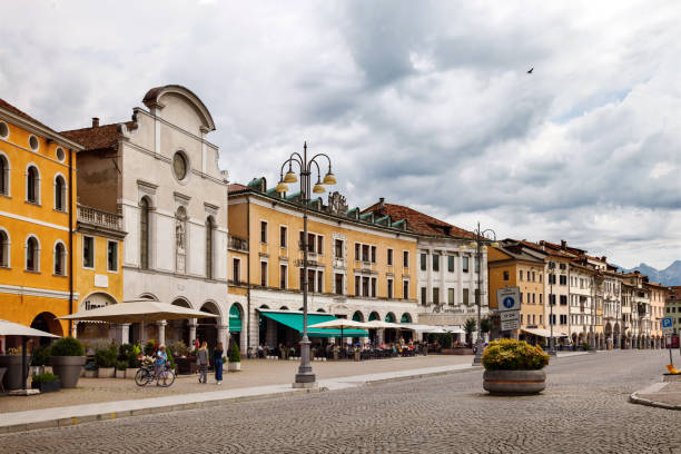 Belluno, Italy - JUL 05, 2018: The Martiri square in summer cloudy day