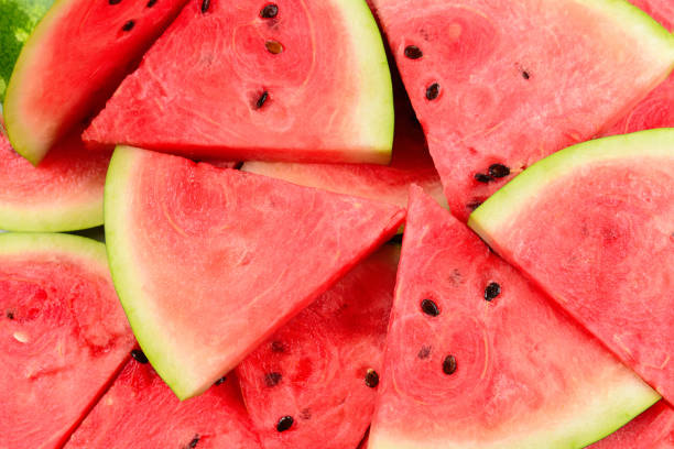 istock Juicy watermelon slices background. Top view. 1219949735