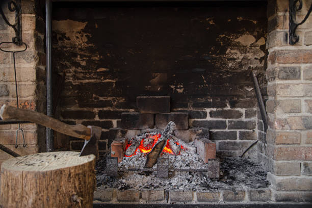 istock Fireplace with a burning fire, comfort and atmosphere. 1219949785