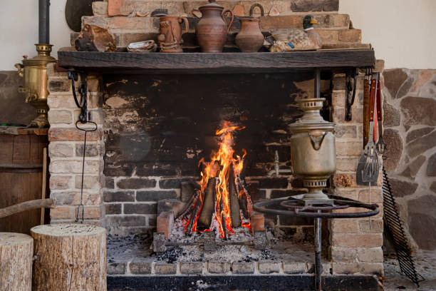 istock Fireplace with a burning fire, comfort and atmosphere. 1219949801