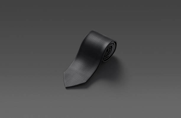 istock Blank black rolled neck tie mockup, dark background 1219951620