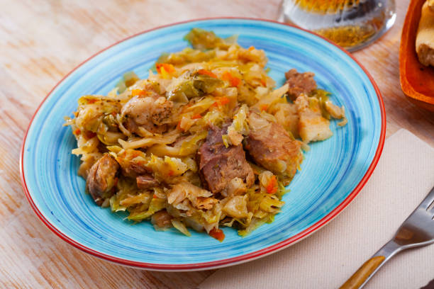 istock Stew of cabbage with pork 1219952075