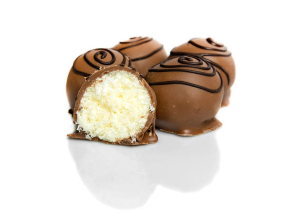 istock Chocolate candies isolated on white background. Food. 1219952793