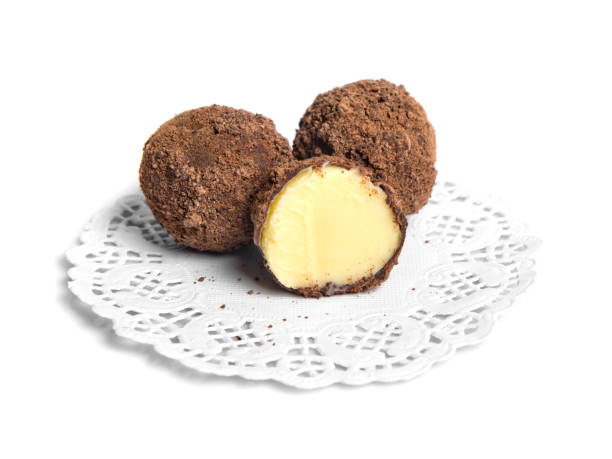 istock Chocolate candies isolated on white background. Food. 1219952806