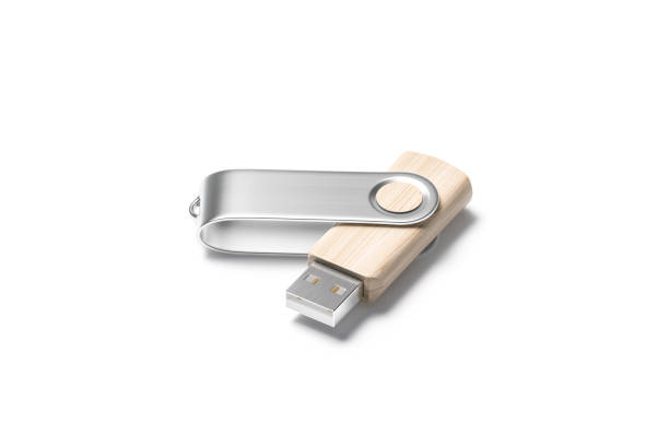 Blank wood opened usb stick with silver cap mockup Blank wood opened usb stick with silver cap mockup, 3d rendering. Empty memo pendrive for computer connection mock up, isolated, side view. Clear hardware accessory for digital memo mokcup template. wooden flash drive stock pictures, royalty-free photos & images