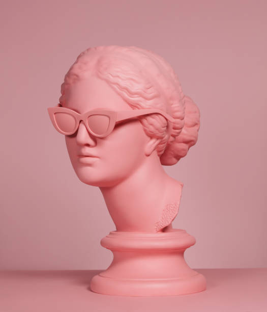 istock Pink colored modern Greek Goddess with sunglasses 1219957028