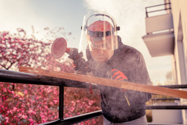 istock DIY project on balcony. Fixing furniture. 1219957987