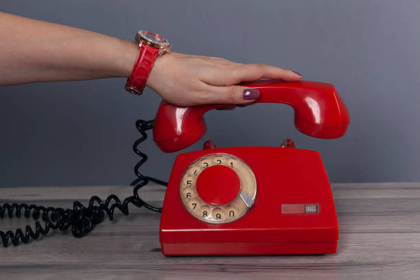 istock woman hand vintage phone 1219961329