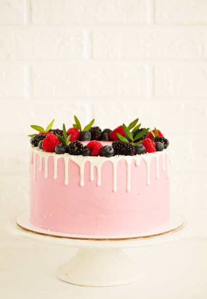 istock Sponge cake for his birthday on a black background. 1219962156