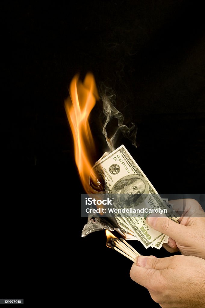 Money Up In Smoke  Burning Stock Photo