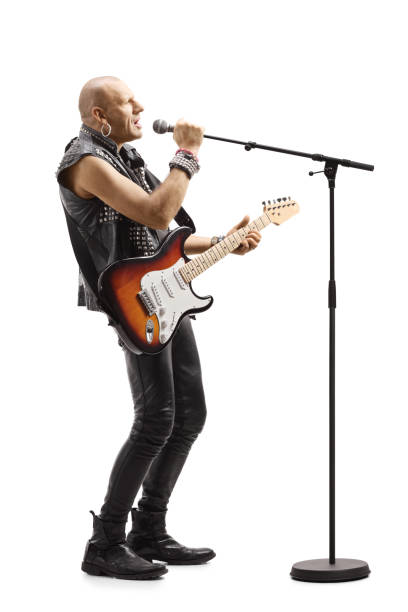 istock Male singer with an electric guitar 1219970978