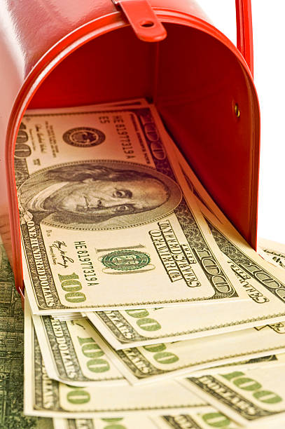 istock Money In The Red Mailbox 121997136