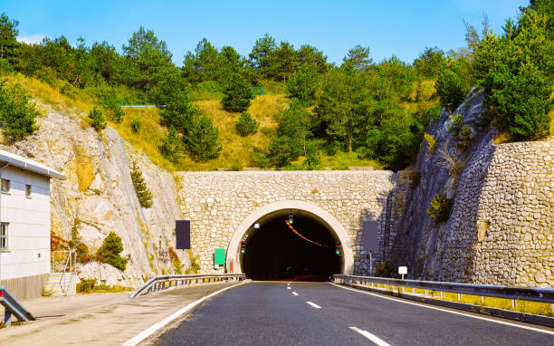 istock Road with underpass tunnel at Slovenia 1219972533