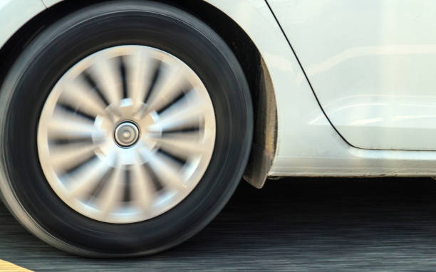 istock Car tire on road in Switzerland 1219972634