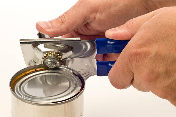 Using Can Opener stock photo