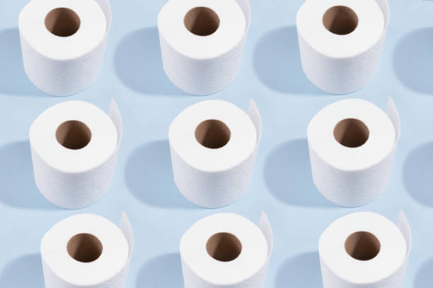 istock White Toilet Paper on Blue Background 1219973637