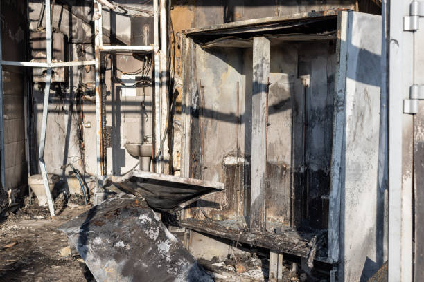 istock burnt refrigerator in the supermarket after intense fire burning. 1219975601