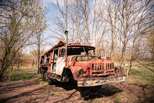 Old rusty abandoned Soviet fire truck in Chernobyl exclusion zone Ukraine