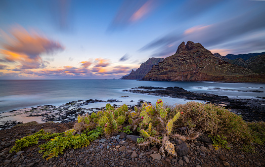 Landscape of the coast of Tenerife with the long exposure technique during sunset.