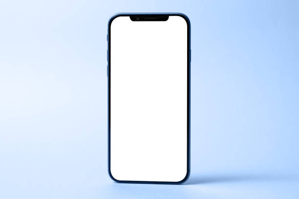 istock Smartphone mockup, phone with blank screen and shadow isolated on blue background. Modern technologies social networks and applications. Symbol of lightness freshness airiness. Copy space 1219977734