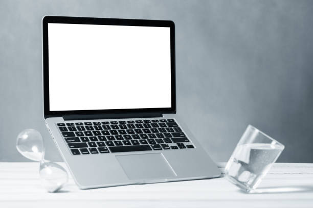istock Laptop mockup, computer with blank screen flying under the table. Symbol of lightness freshness airiness. Modern technologies social networks and applications. Copy space 1219978272
