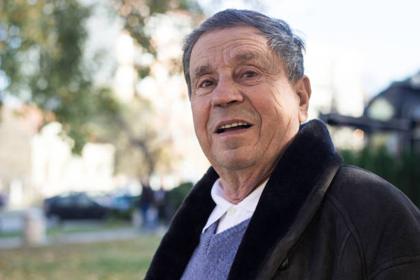istock Portrait of senior man smiling 1219980075