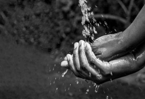 Washing hands with running water and soap. For hygiene and covid-19 prevention concepts.