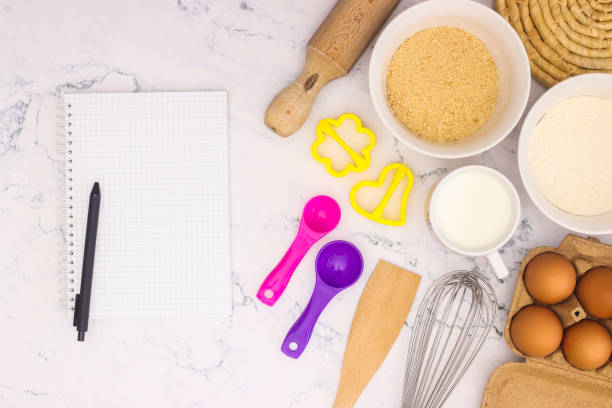 istock Cooking groceries for baking and making cookies on the kitchen table 1219985449