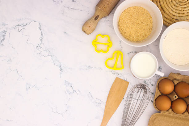 istock Cooking groceries for baking and making cookies on the kitchen table 1219985523