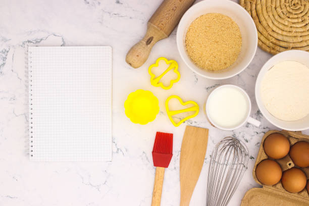 istock Cooking groceries for baking and making cookies on the kitchen table 1219985525