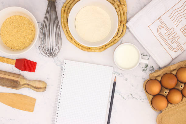 istock Cooking groceries for baking and making cookies on the kitchen table 1219985540