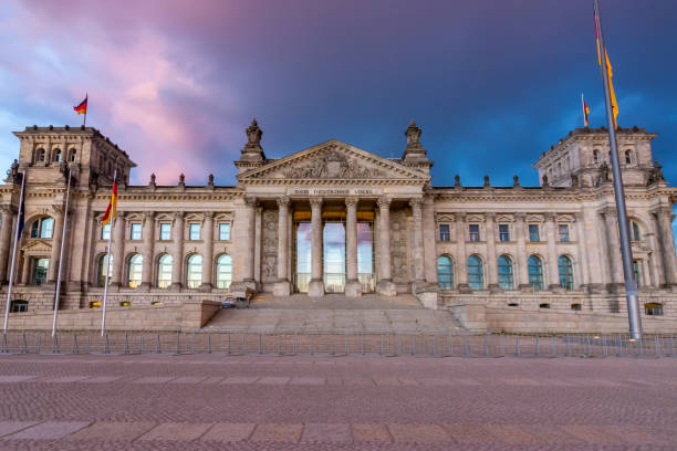 istock Reichstag building (Bundestag - parliament of Germany) in Berlin at sunset 1219987846