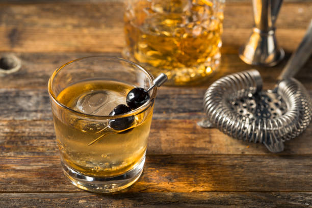 istock Boozy Bourbon Old Fashioned with Maraschino Cherries 1219990200