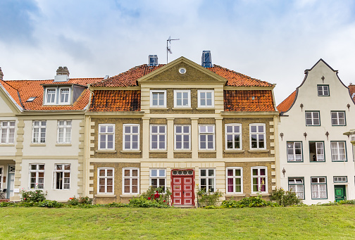 Historic houses on the dike in Gluckstadt, Germany