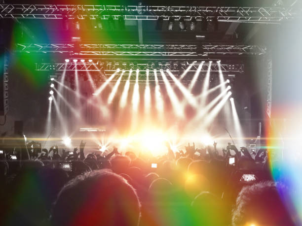 istock Filming concert on smart phone 1219994438