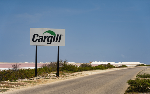 Kralendijk, Bonaire - April 19 2020: The Cargill company holds on Bonaire a Sea Salt plant, which is done by evaporation of sea water in the open air. Which gives Salt crystals.