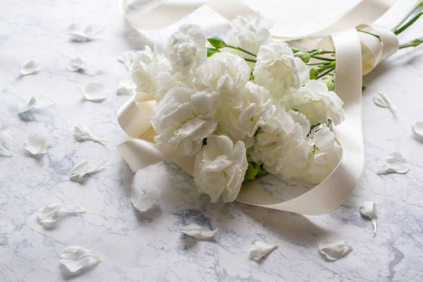 istock Bouquet of white carnations 1219998697