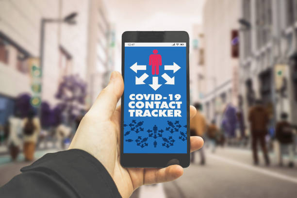 TRACKING Covid-19 app on smartphone software in crowd of people with bluetooth notification
