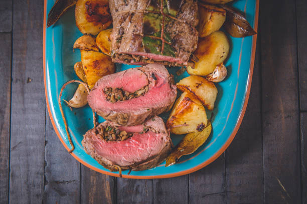 istock Meat loaf served with peaches 1219999928