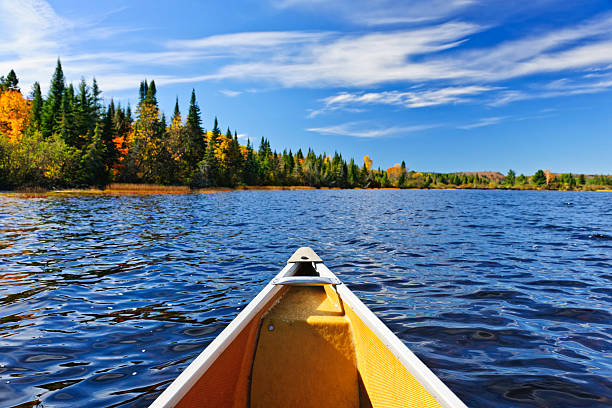 Canoe bow on lake stock photo