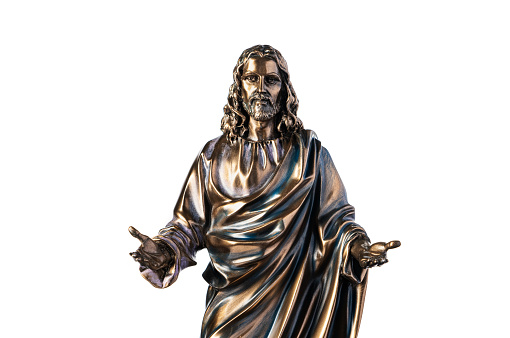 A bronze statue of a Jesus Christ isolated on white
