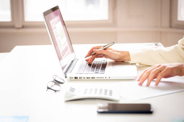 istock Businesswoman's hand typing on the keyboard 1220002799