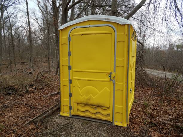 istock yellow bathroom or restroom outdoor with trees 1220003874
