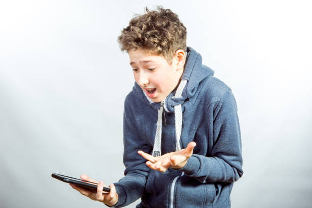istock Emotions and joy of a young man 1220003988