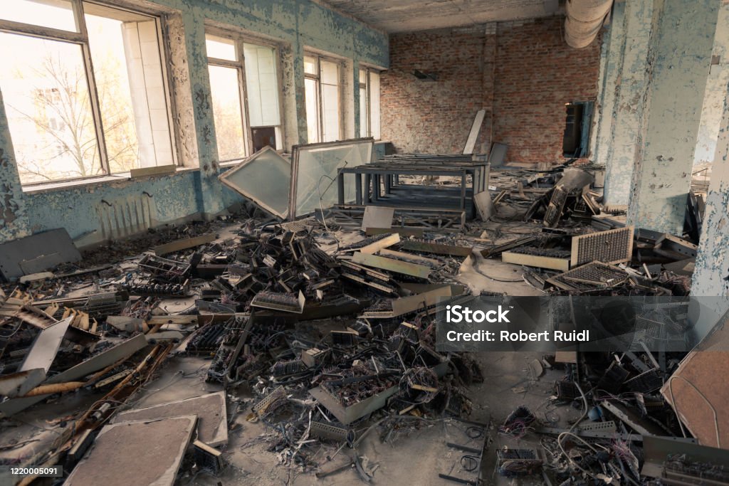 A pile of electronic scrap from the 1980s lying around in the post office of Pripyat, Chernobyl Exclusion Zone 1980-1989 Stock Photo