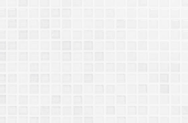 istock White or gray ceramic wall and floor tiles abstract background. Design geometric mosaic texture decoration of the bedroom. Simple seamless pattern for backdrop hospital wall, canteen and grid paper. 1220012927